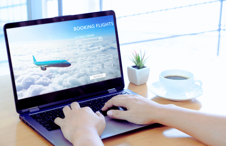 Track Cheap Flights - A laptop showing a travel flight booking website