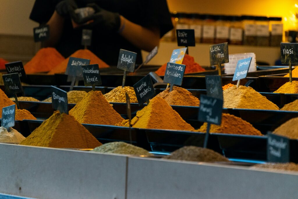 Food Travel Hacks - A wide selection of spices sold in a local market