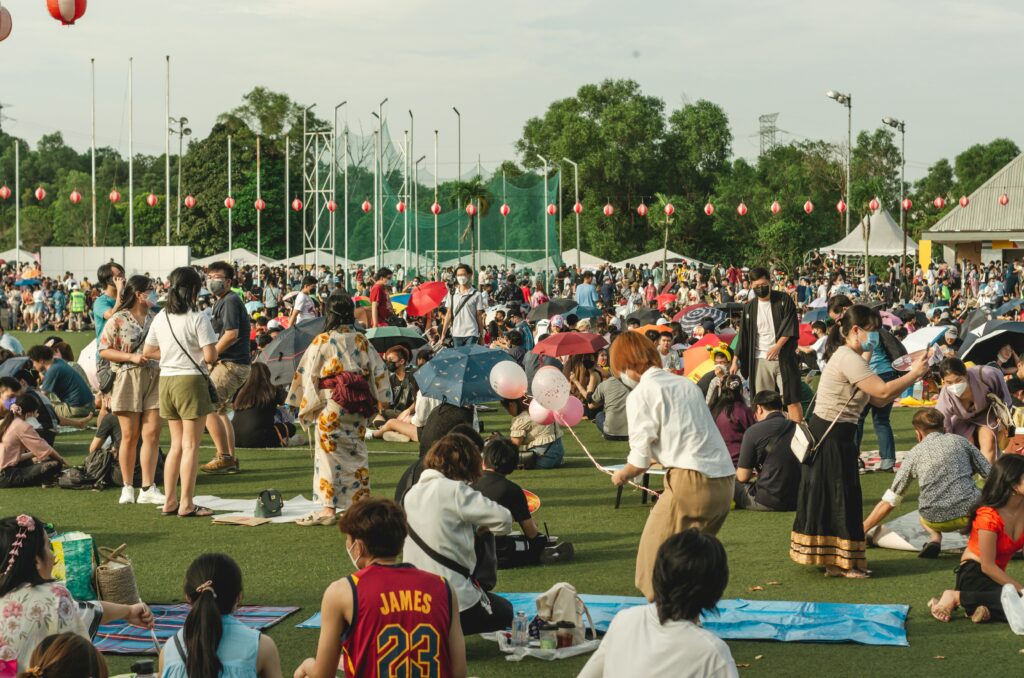 Free Attractions and Activities - People having picnic together with friends and families in a Local Festivals and Events