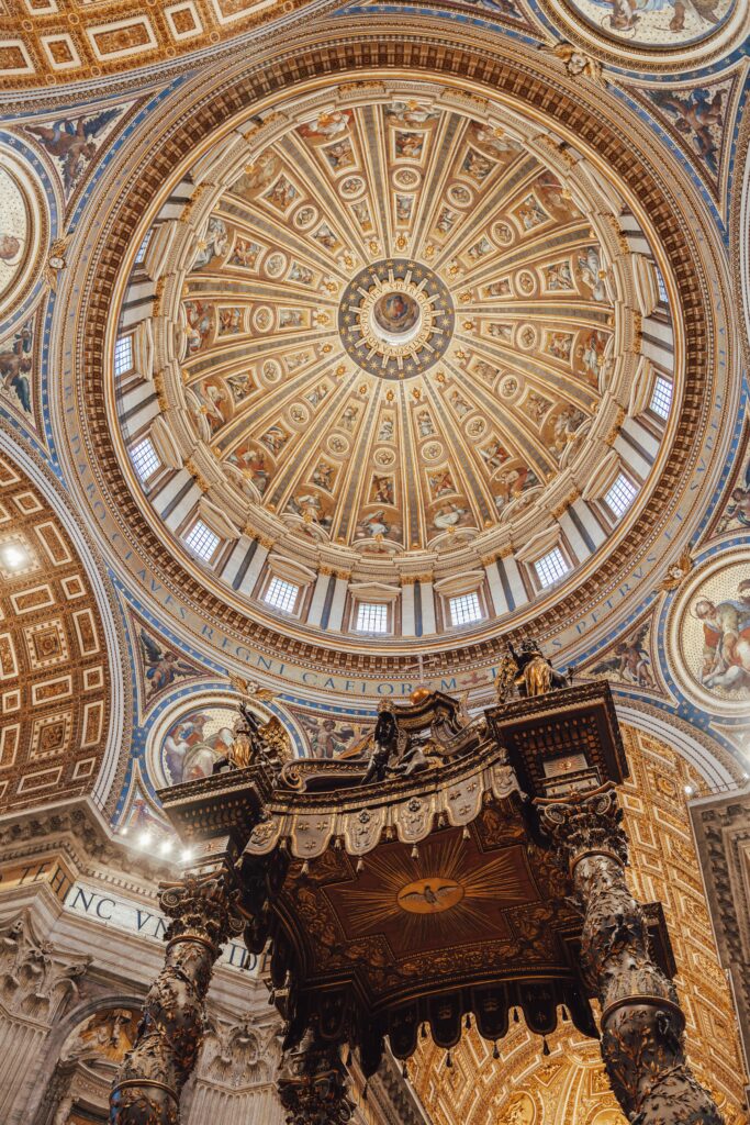 Traveletty - Free Travel Attractions - The golden ornamented ceiling of St. Peter's Basilica in Rome, Italy