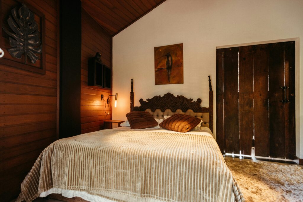 Traveletty - Farm Stays - cozy wooden rustic style bedroom in a farm house