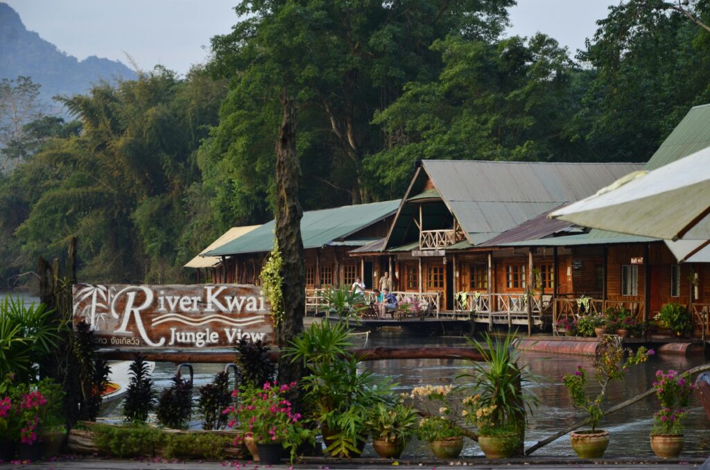 Traveletty - Floating Cabins - serene river kwai jungle retreat view in Thailand