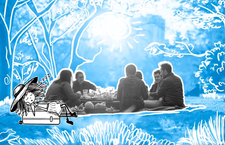 Traveletty - Urban Parks for Picnicking - A group of people enjoying picnic at a park in the city